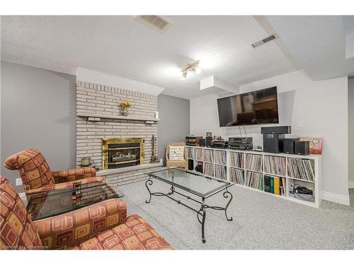 22 Pezzack Street, Cambridge, ON - Indoor Photo Showing Living Room With Fireplace