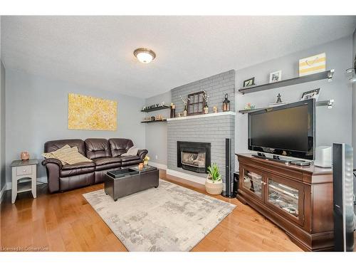 22 Pezzack Street, Cambridge, ON - Indoor Photo Showing Living Room With Fireplace