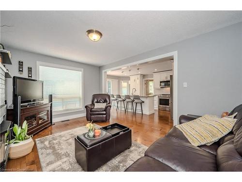 22 Pezzack Street, Cambridge, ON - Indoor Photo Showing Living Room With Fireplace