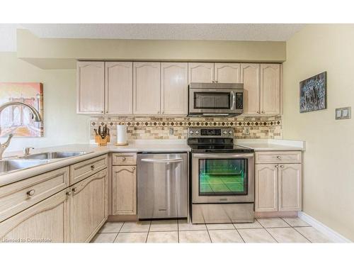 211 Britton Place, Kitchener, ON - Indoor Photo Showing Kitchen With Double Sink