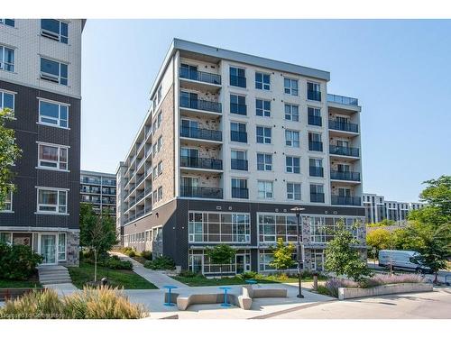 G202-275 Larch Street, Waterloo, ON - Outdoor With Facade