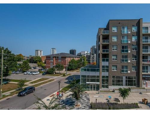 G202-275 Larch Street, Waterloo, ON - Outdoor With Facade