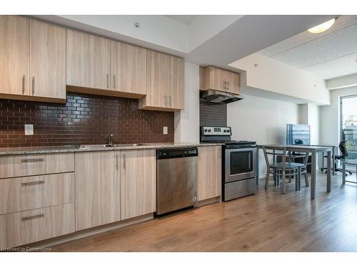 G202-275 Larch Street, Waterloo, ON - Indoor Photo Showing Kitchen With Stainless Steel Kitchen With Upgraded Kitchen