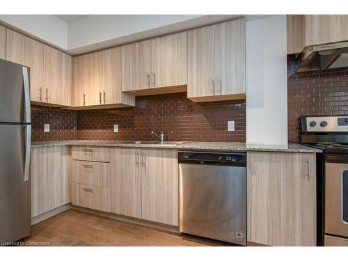 G202-275 Larch Street, Waterloo, ON - Indoor Photo Showing Kitchen With Stainless Steel Kitchen