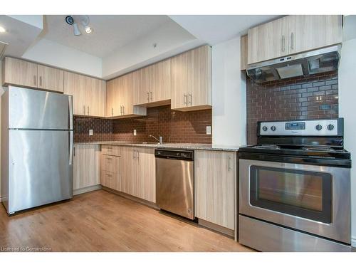 G202-275 Larch Street, Waterloo, ON - Indoor Photo Showing Kitchen With Stainless Steel Kitchen