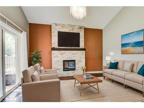 83 Bayne Crescent, Cambridge, ON - Indoor Photo Showing Living Room With Fireplace