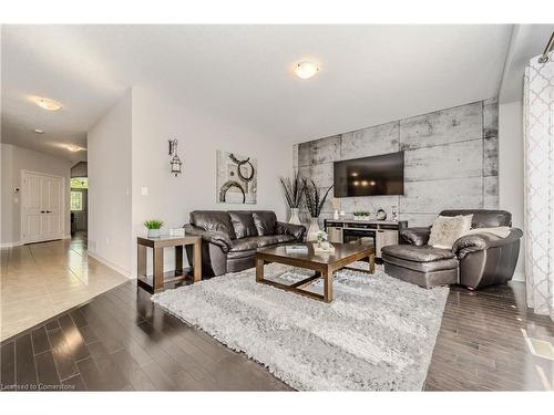 15 Doon Creek Street, Kitchener, ON - Indoor Photo Showing Living Room With Fireplace