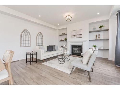 70 Harpin Way W, Fergus, ON - Indoor Photo Showing Living Room With Fireplace