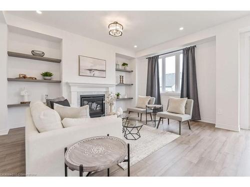 70 Harpin Way W, Fergus, ON - Indoor Photo Showing Living Room With Fireplace