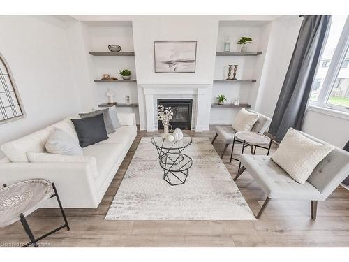 70 Harpin Way W, Fergus, ON - Indoor Photo Showing Living Room With Fireplace