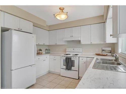 127 Rush Meadow Street, Kitchener, ON - Indoor Photo Showing Kitchen With Double Sink