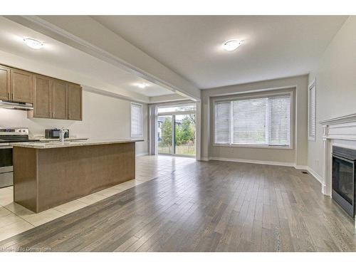 109 Huntingford Trail, Woodstock, ON - Indoor Photo Showing Other Room With Fireplace