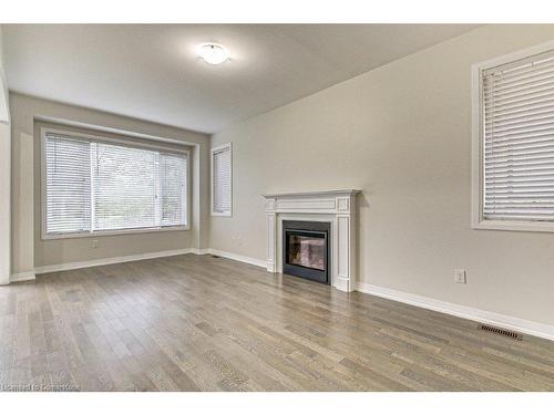 109 Huntingford Trail, Woodstock, ON - Indoor With Fireplace