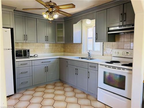 63 Old Carriage Drive, Kitchener, ON - Indoor Photo Showing Kitchen With Double Sink