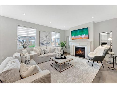 2324 Tokala Trail, London, ON - Indoor Photo Showing Living Room With Fireplace