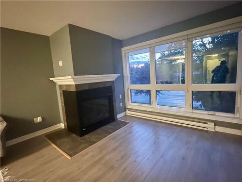 318-15 Jacksway Crescent, London, ON - Indoor Photo Showing Living Room With Fireplace