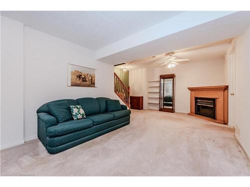 22-50 Midland Drive, Kitchener, ON - Indoor Photo Showing Living Room With Fireplace