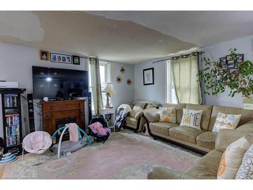 410 Queen Street S, Palmerston, ON - Indoor Photo Showing Living Room With Fireplace