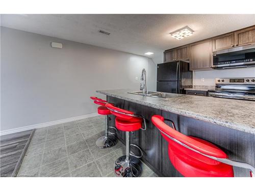 3C-1660 Fischer Hallman Road, Kitchener, ON - Indoor Photo Showing Kitchen With Double Sink