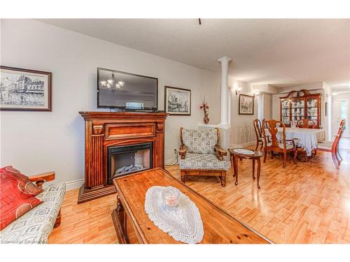 732 Grand Banks Drive, Waterloo, ON - Indoor Photo Showing Living Room With Fireplace