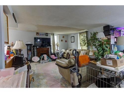 410 Queen Street S, Palmerston, ON - Indoor Photo Showing Other Room With Fireplace