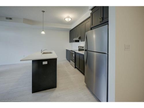 A012-142 Foamflower Place, Waterloo, ON - Indoor Photo Showing Kitchen With Double Sink