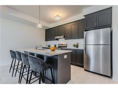 A012-142 Foamflower Place, Waterloo, ON - Indoor Photo Showing Kitchen With Upgraded Kitchen