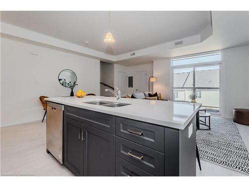 A012-142 Foamflower Place, Waterloo, ON - Indoor Photo Showing Kitchen With Double Sink