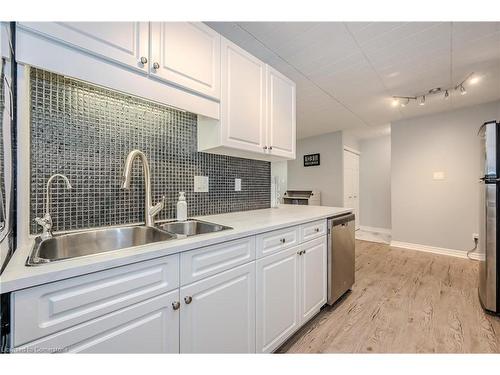 54-63 Conroy Crescent, Guelph, ON - Indoor Photo Showing Kitchen With Double Sink