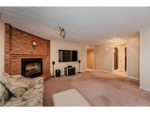 219 Misty Court, Kitchener, ON - Indoor Photo Showing Living Room With Fireplace