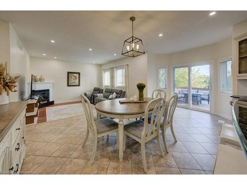 58 West Acres Crescent, Kitchener, ON - Indoor Photo Showing Dining Room With Fireplace