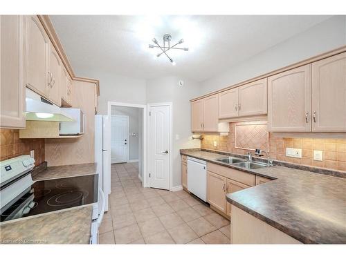 14-87 Stonecroft Way, New Hamburg, ON - Indoor Photo Showing Kitchen With Double Sink