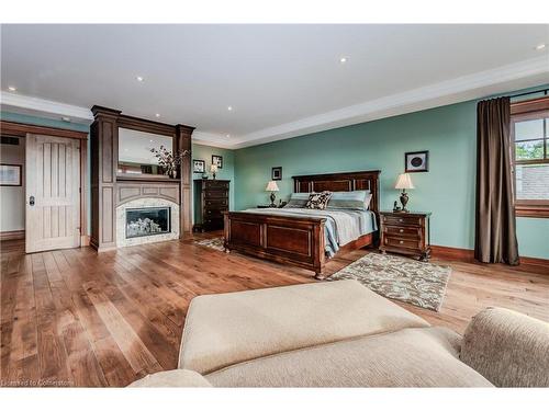 1305 Sawmill Road, West Montrose, ON - Indoor Photo Showing Bedroom With Fireplace