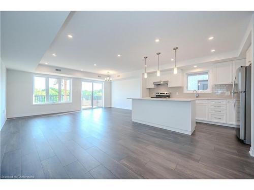 J037-15 Stauffer Woods Trail, Kitchener, ON - Indoor Photo Showing Kitchen With Upgraded Kitchen