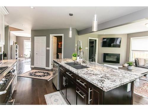 130 Chandos Drive, Kitchener, ON - Indoor Photo Showing Kitchen With Fireplace With Double Sink With Upgraded Kitchen