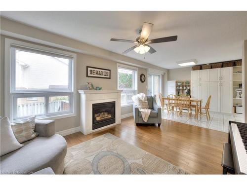 532 Silvermeadow Place, Waterloo, ON - Indoor Photo Showing Living Room With Fireplace