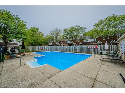 24-525 Beechwood Drive, Waterloo, ON - Outdoor With In Ground Pool With Backyard