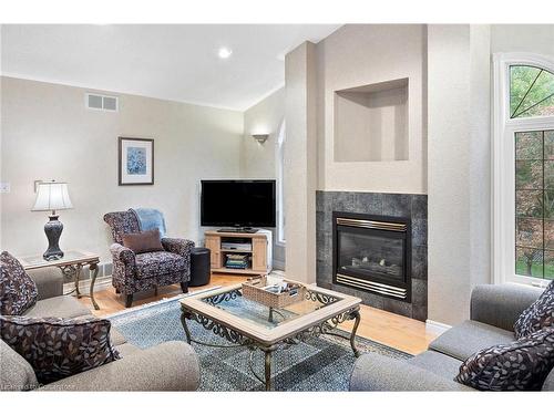 1483 Pope Street, Lasalle, ON - Indoor Photo Showing Living Room With Fireplace