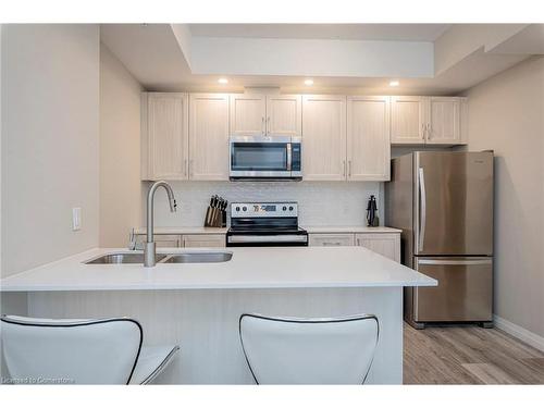 1212-108 Garment Street, Kitchener, ON - Indoor Photo Showing Kitchen With Stainless Steel Kitchen With Double Sink With Upgraded Kitchen