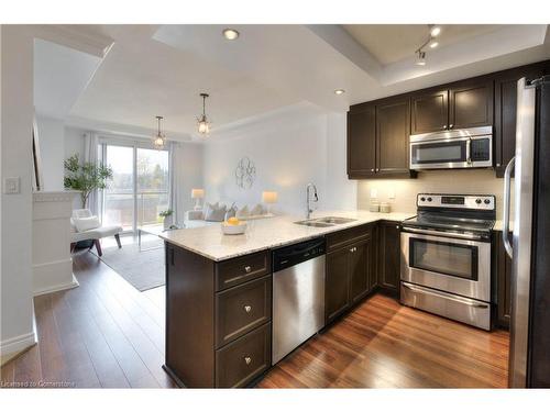 310-539 Belmont Avenue W, Kitchener, ON - Indoor Photo Showing Kitchen With Double Sink