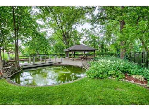 1908-6 Willow Street, Waterloo, ON - Outdoor With In Ground Pool With Backyard