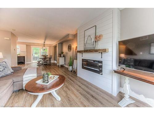 7-600 White Elm Boulevard, Waterloo, ON - Indoor Photo Showing Living Room With Fireplace