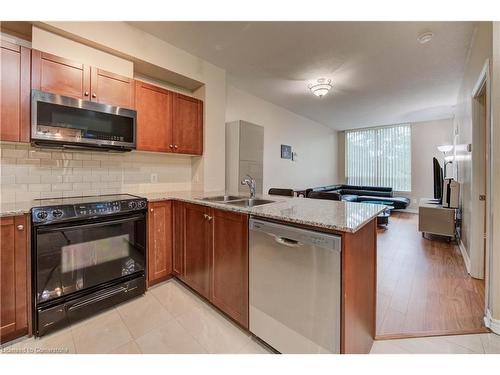 205-3504 Hurontario Street, Mississauga, ON - Indoor Photo Showing Kitchen With Double Sink