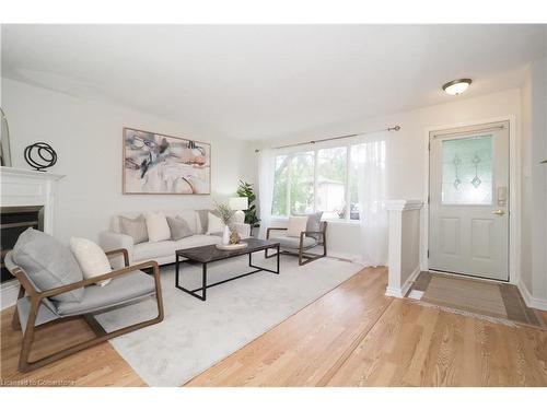 B-557 Brookhaven Crescent, Waterloo, ON - Indoor Photo Showing Living Room With Fireplace