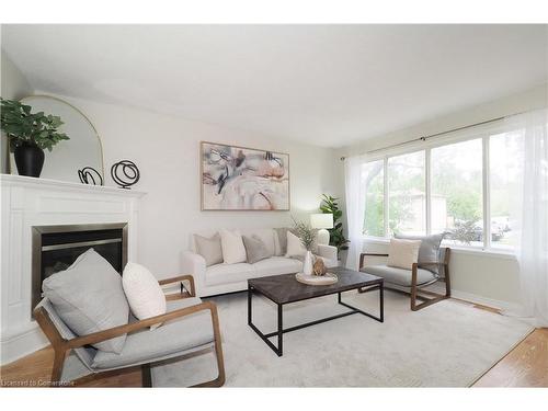 B-557 Brookhaven Crescent, Waterloo, ON - Indoor Photo Showing Living Room With Fireplace