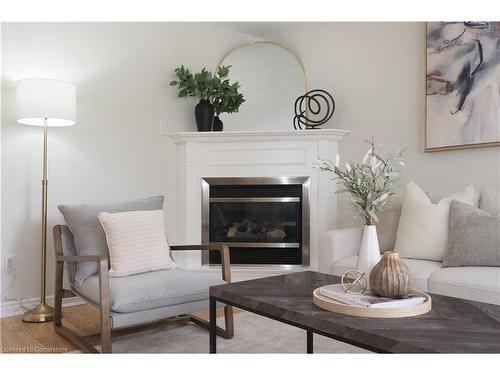 B-557 Brookhaven Crescent, Waterloo, ON - Indoor Photo Showing Living Room With Fireplace