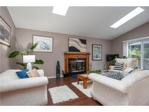 323 Pastern Trail, Waterloo, ON - Indoor Photo Showing Living Room With Fireplace