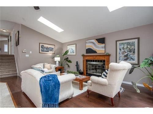 323 Pastern Trail, Waterloo, ON - Indoor Photo Showing Living Room With Fireplace