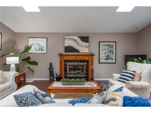 323 Pastern Trail, Waterloo, ON - Indoor Photo Showing Living Room With Fireplace