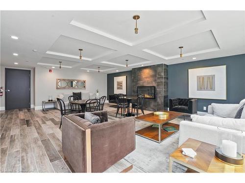 212-73 Arthur Street S, Guelph, ON - Indoor Photo Showing Living Room With Fireplace